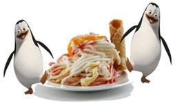 Penguin with ice cream spaghetti topped with a cookie